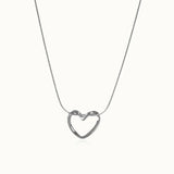 Colgante en Forma de Corazón con Nudo de Oro