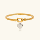 Pulsera de Oro con Banda Torcida Solenne