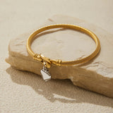 Pulsera de Oro con Banda Torcida Solenne