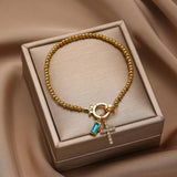 Pulsera Cruz de Piedra de Nacimiento Amalia