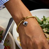 Pulsera de Oro con Banda Torcida Solenne