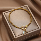 Pulsera Cruz de Piedra de Nacimiento Amalia
