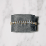 BRAZALETE DE TENIS DORADO